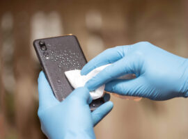 Disinfection, cleaning smartphone.