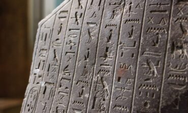 Cover Image: Stone with Egyptian carvings
