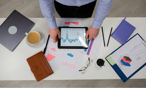 a business person looking at growth graph making enterprise marketing metadata management strategy